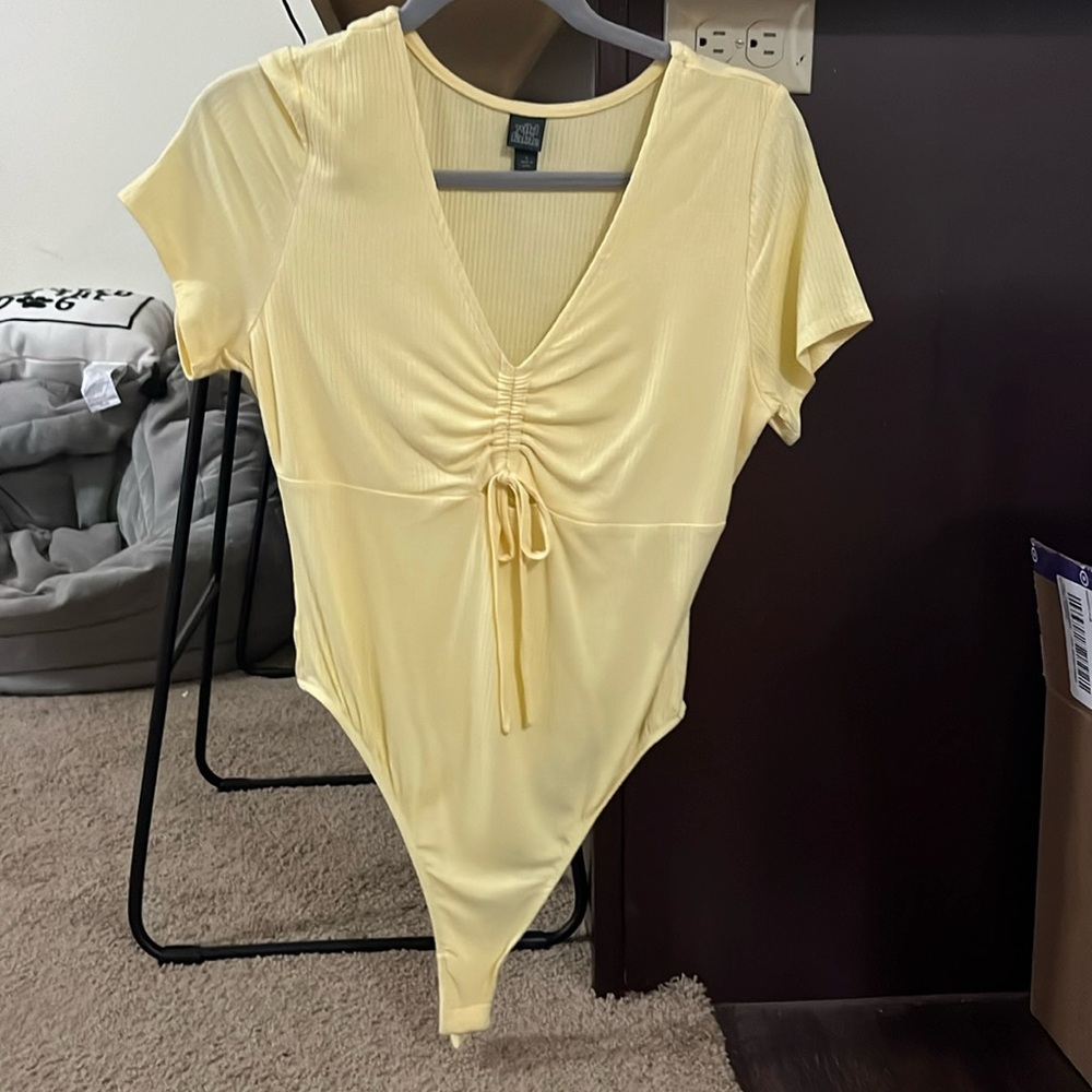 Yellow body suit